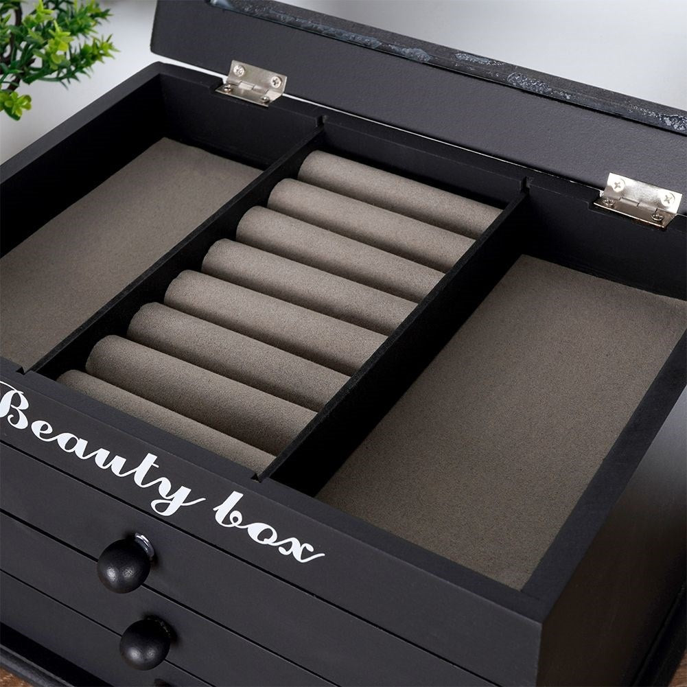Elegant black jewelry box with glass lid and three drawers