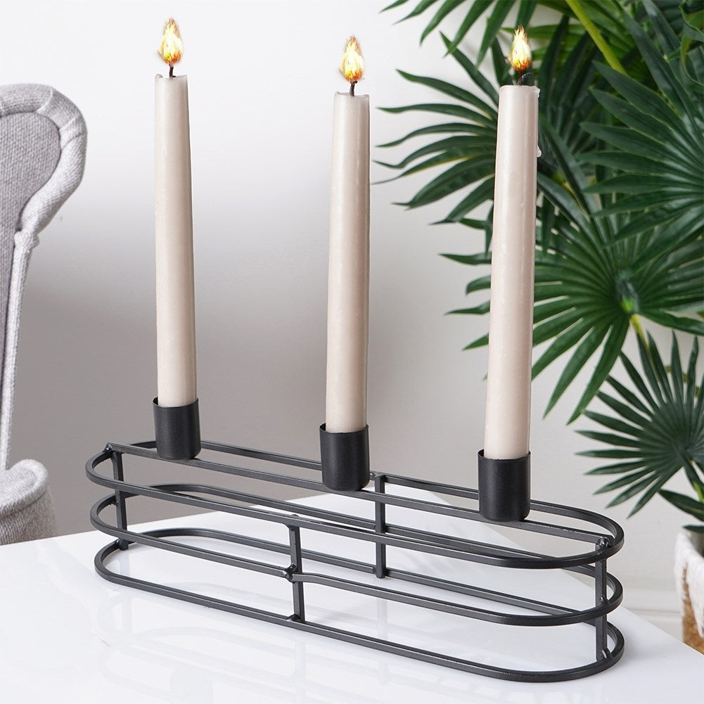 Elegant black metal candle holder for three candles