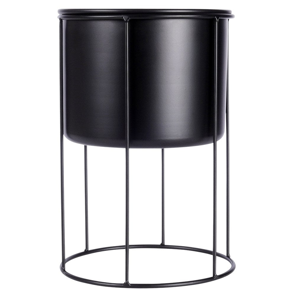Elegant black metal pot on stand for plants