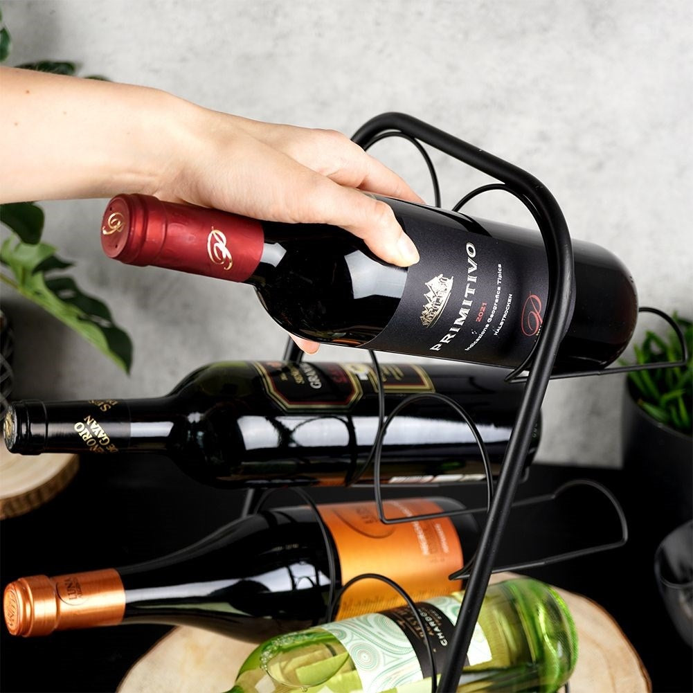 Elegant black metal wine rack for 6 bottles