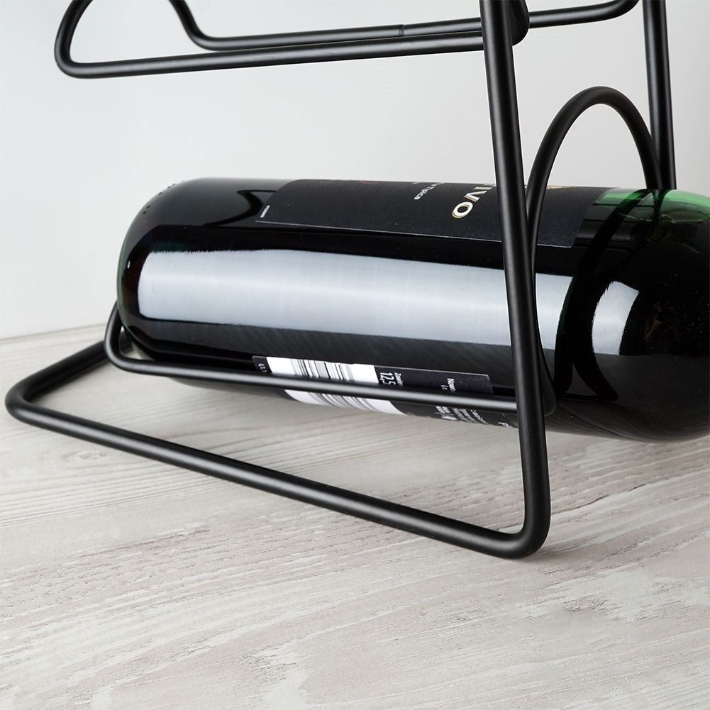Elegant black wine rack for 4 bottles, floor or bench
