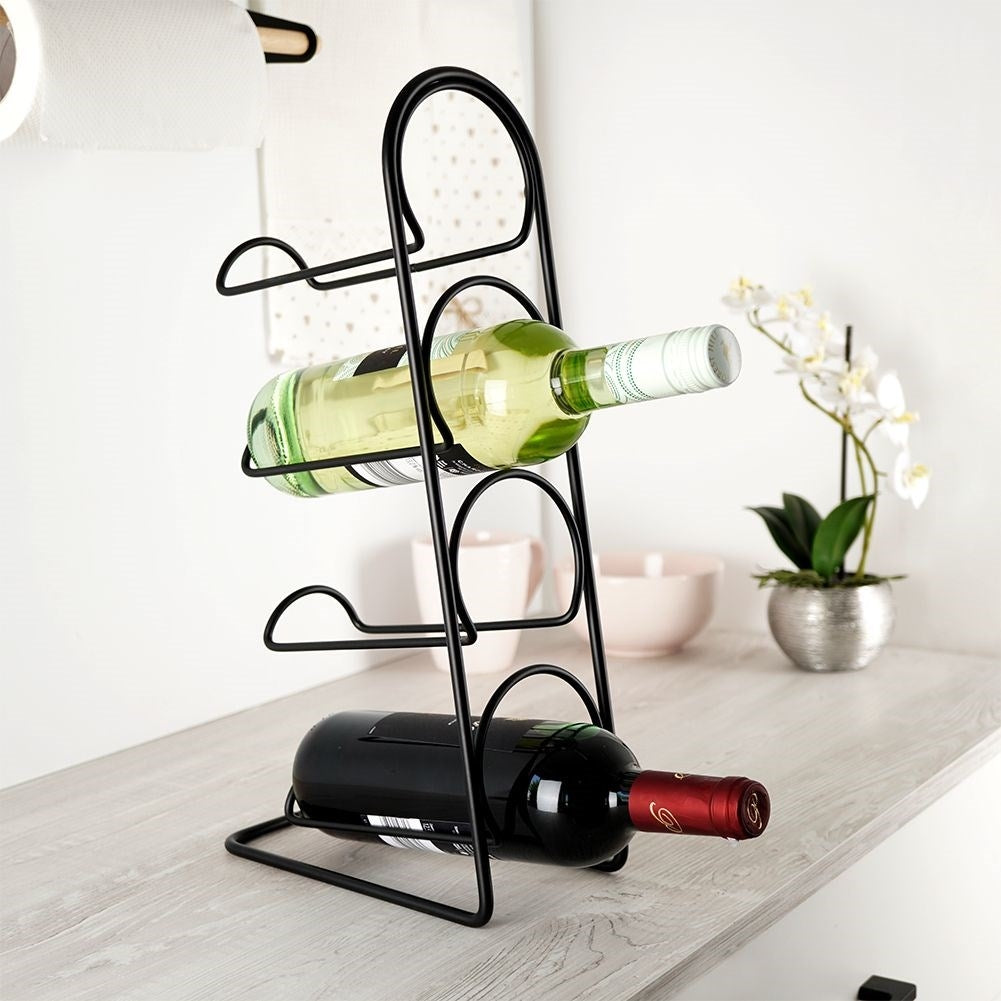 Elegant black wine rack for 4 bottles, floor or bench