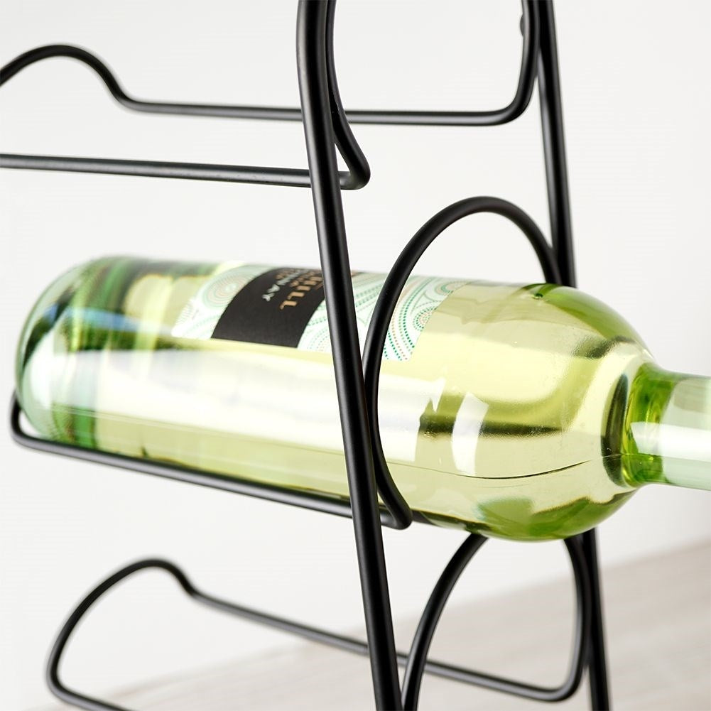 Elegant black wine rack for 4 bottles, floor or bench