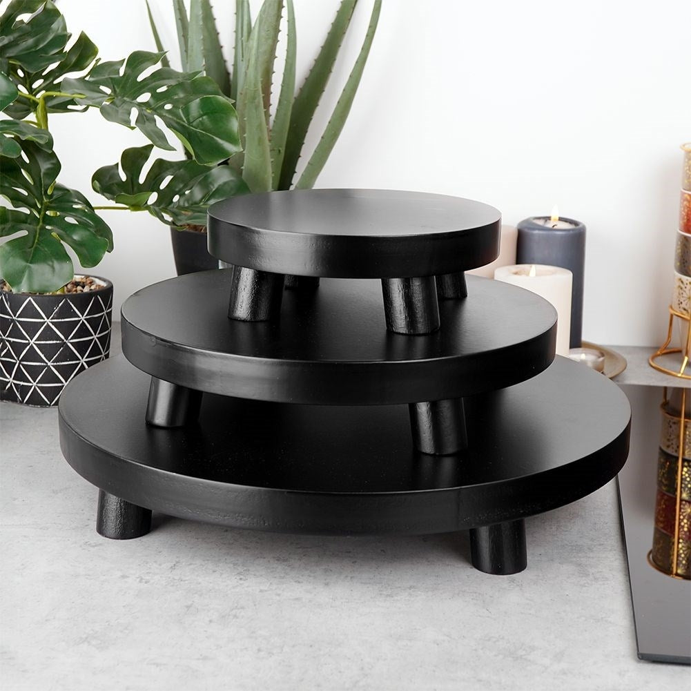 Elegant black wooden tray with legs for decoration and light