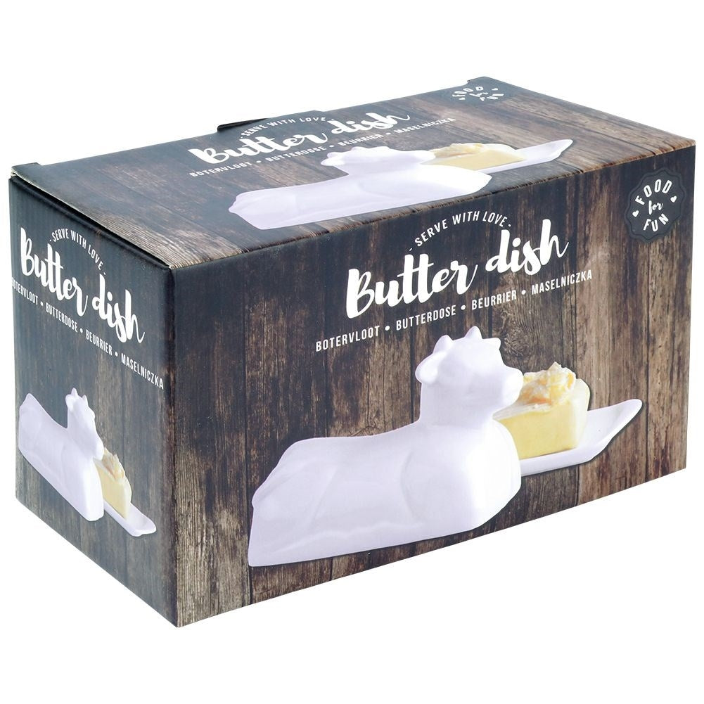 Elegant butter dish in the shape of a cow, white porcelain, with lid