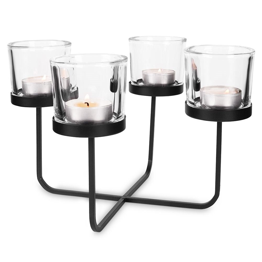Elegant candle holder in black metal with four glass inserts