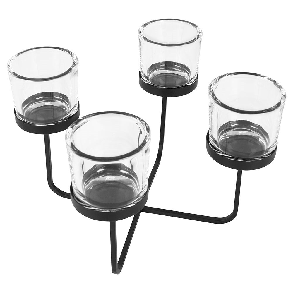 Elegant candle holder in black metal with four glass inserts