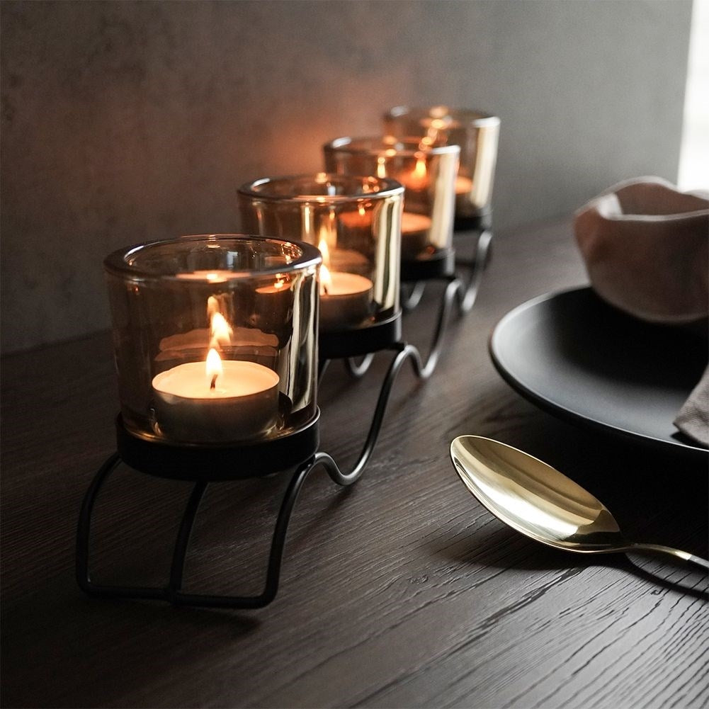 Elegant candlestick for 4 tealights in black metal and glass