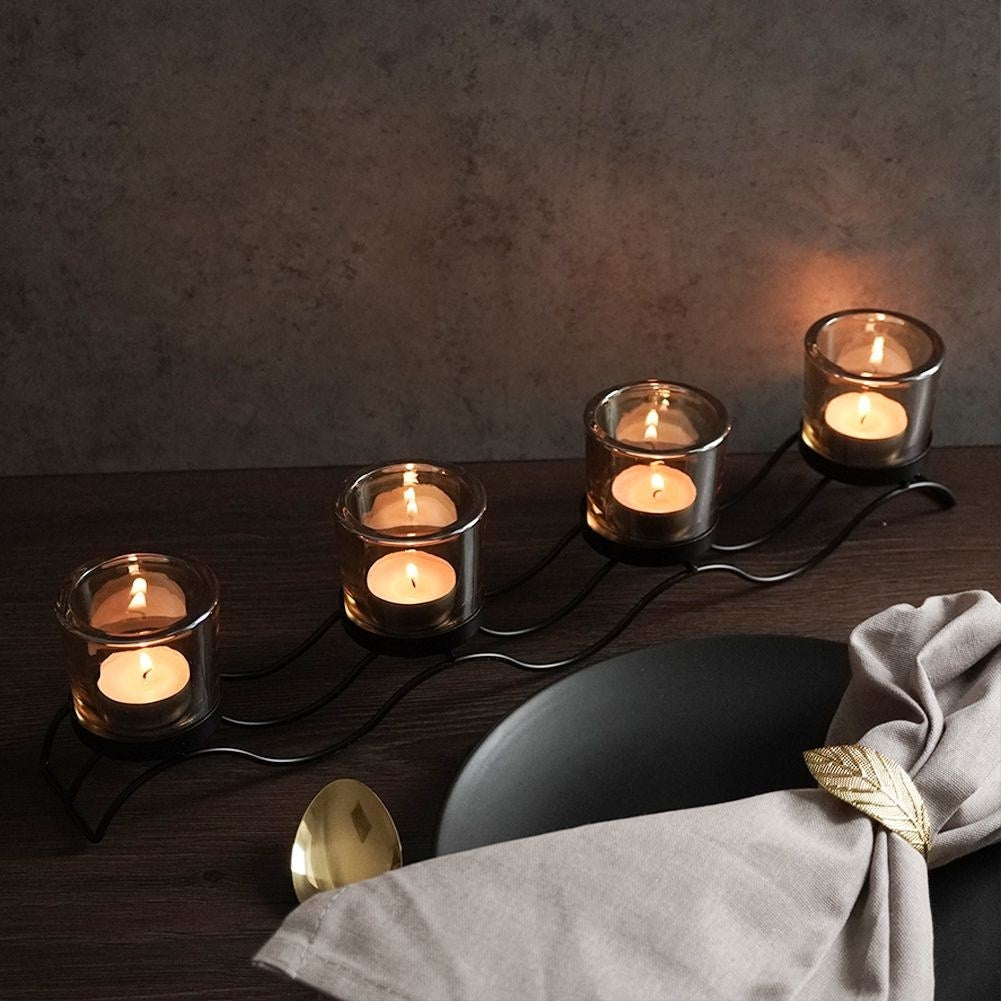 Elegant candlestick for 4 tealights in black metal and glass