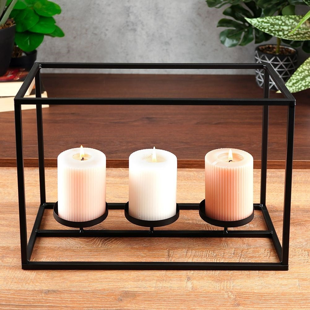 Elegant candlestick for candles and tealights in black metal