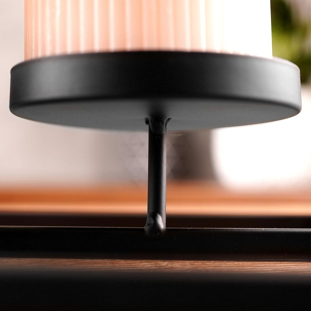 Elegant candlestick for candles and tealights in black metal