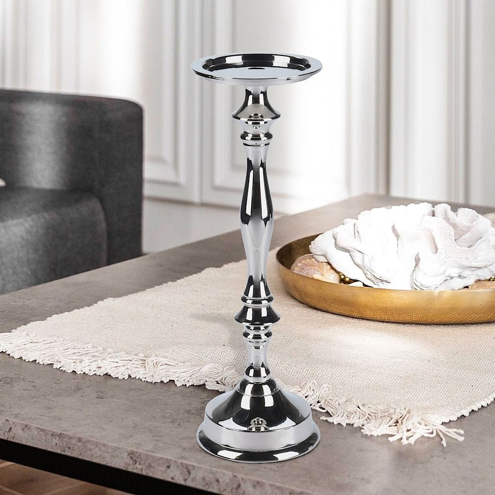 Elegant candlestick in silver, classic style, highly polished surface