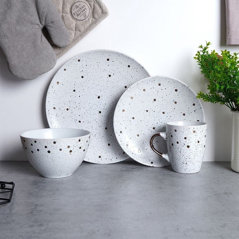 Elegant ceramic plate with black and gold dots