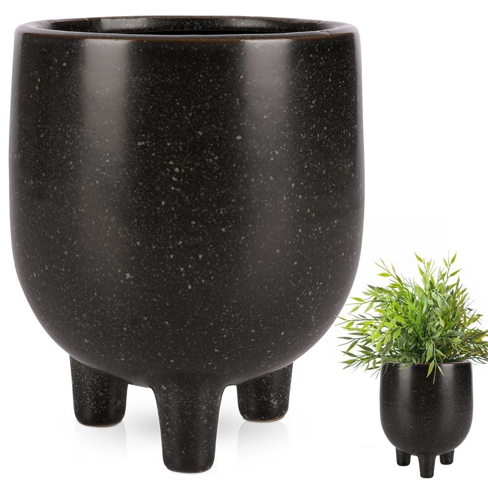 Elegant ceramic pot on legs with black, dotted pattern