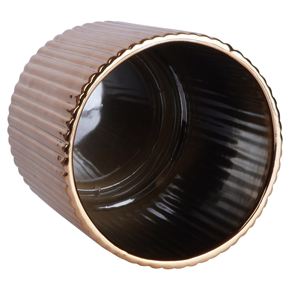 Elegant ceramic pot with ribbed surface and glossy gold colour