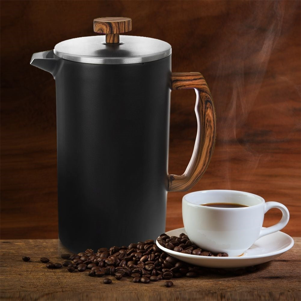 Elegant coffee press in stainless steel with steel piston