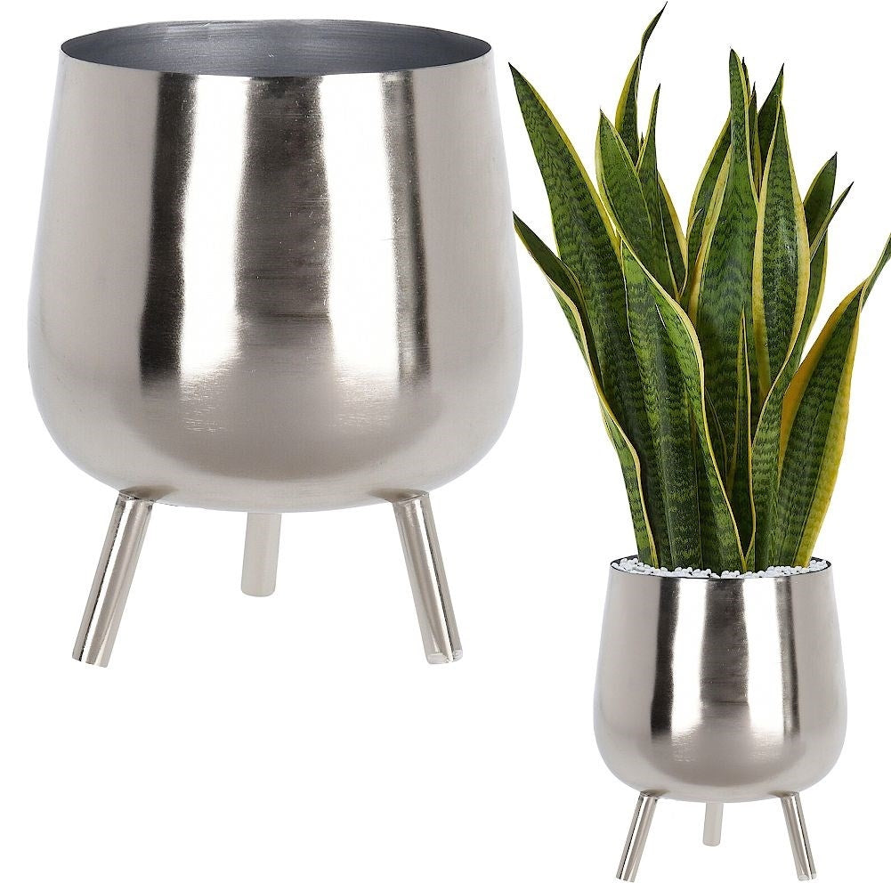 Elegant flower pot on legs in silver for plants