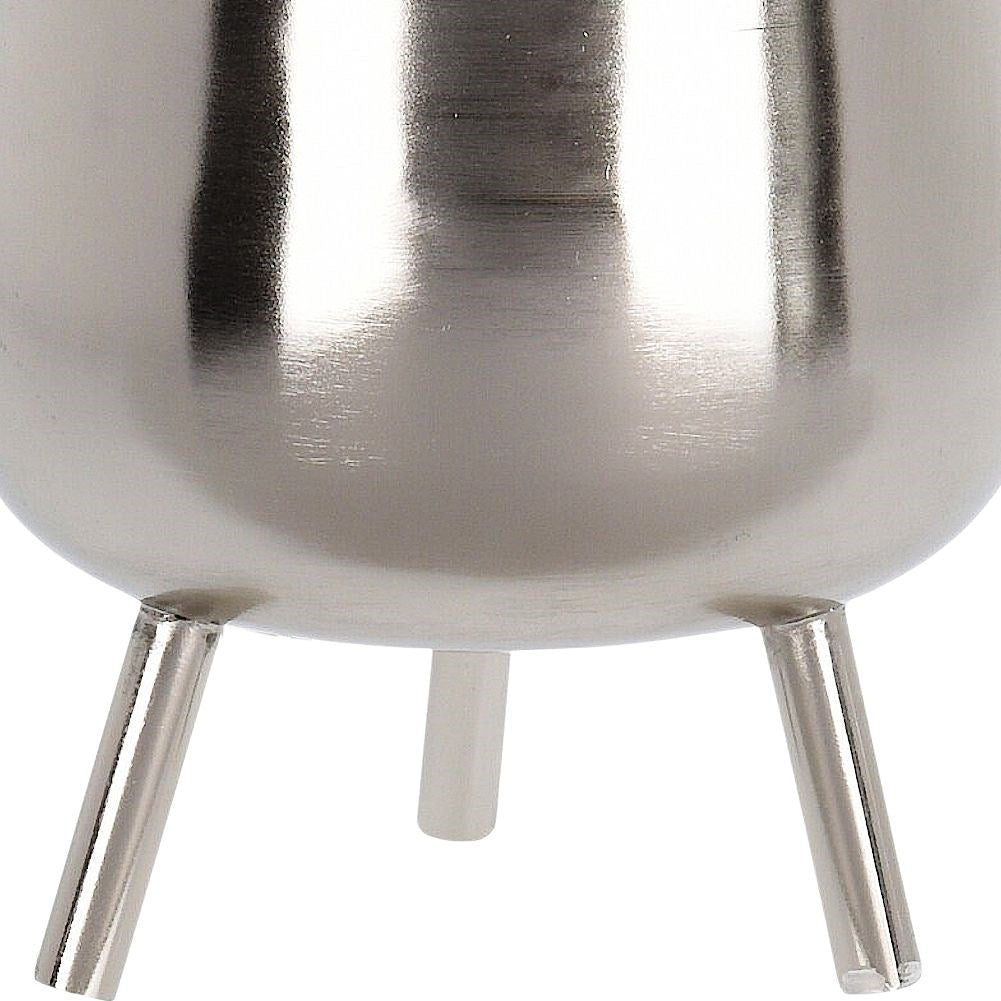 Elegant flower pot on legs in silver for plants
