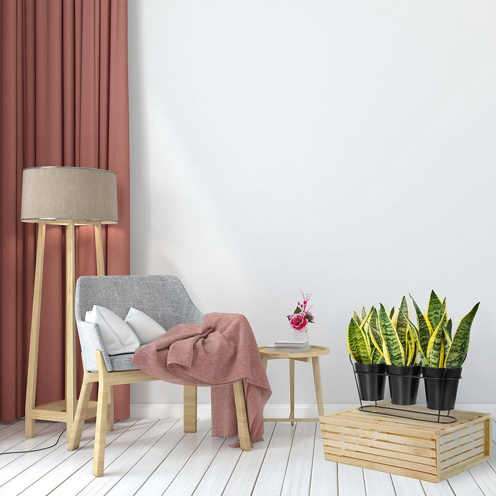 Elegant flower stand for three plants in matt black metal