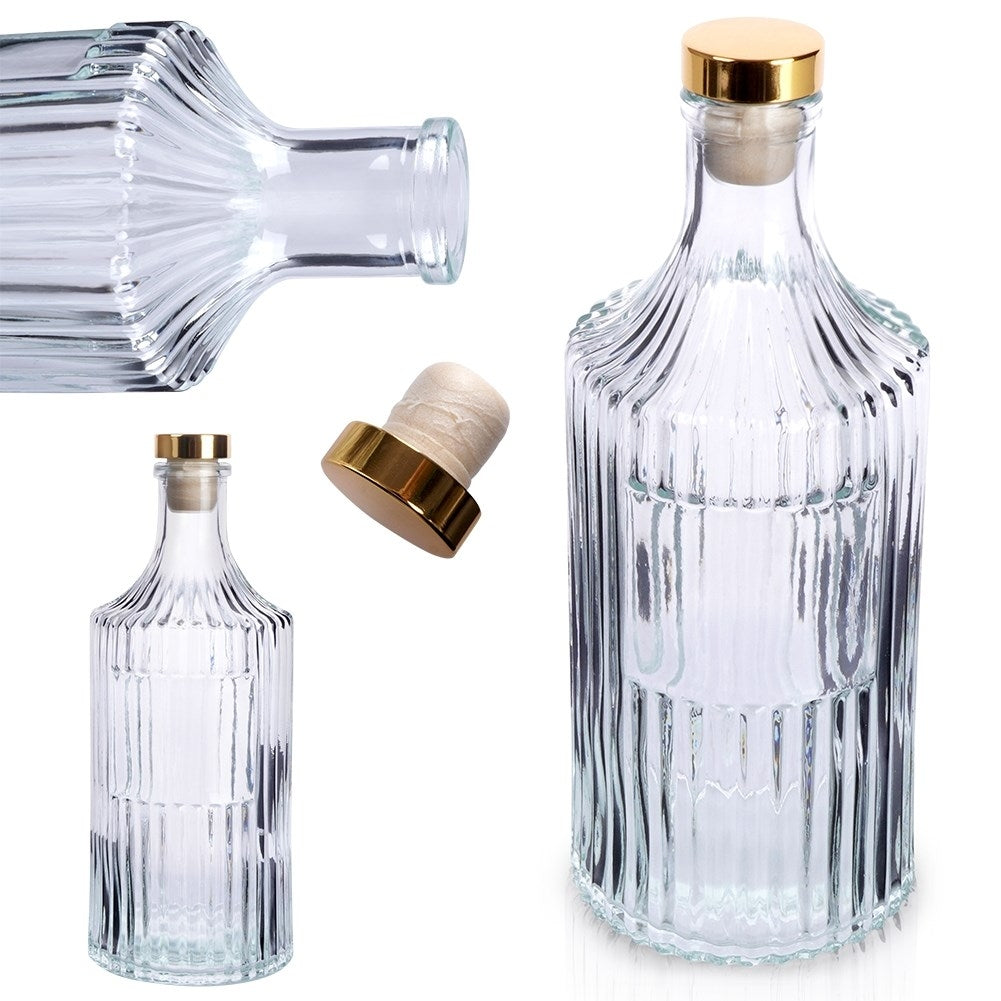 Elegant glass bottle with gold cap for drinks and decoration