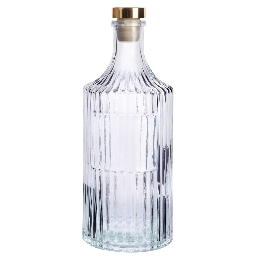 Elegant glass bottle with gold cap for drinks and decoration