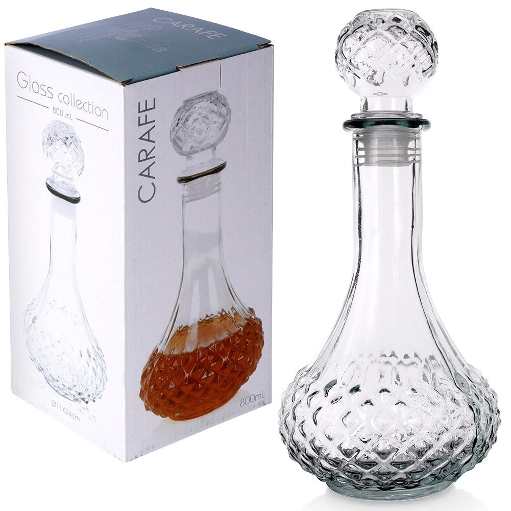 Elegant glass decanter with round cork for drinks and alcohol