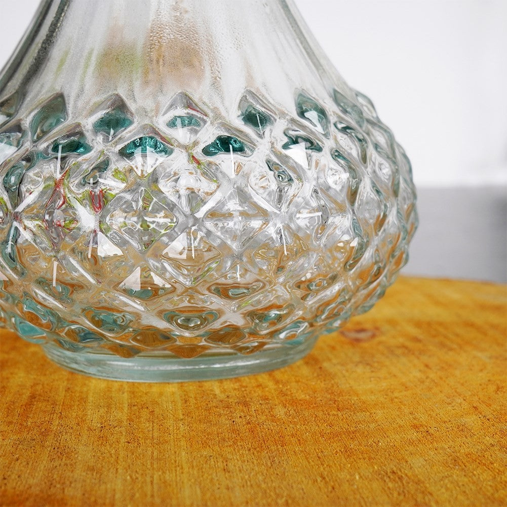 Elegant glass decanter with round cork for drinks and alcohol