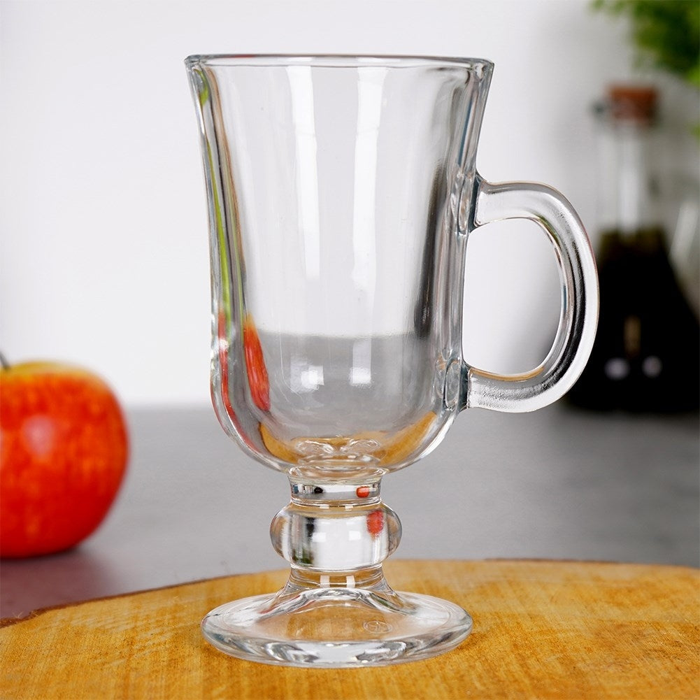 Elegant glass with handle on foot for hot drinks
