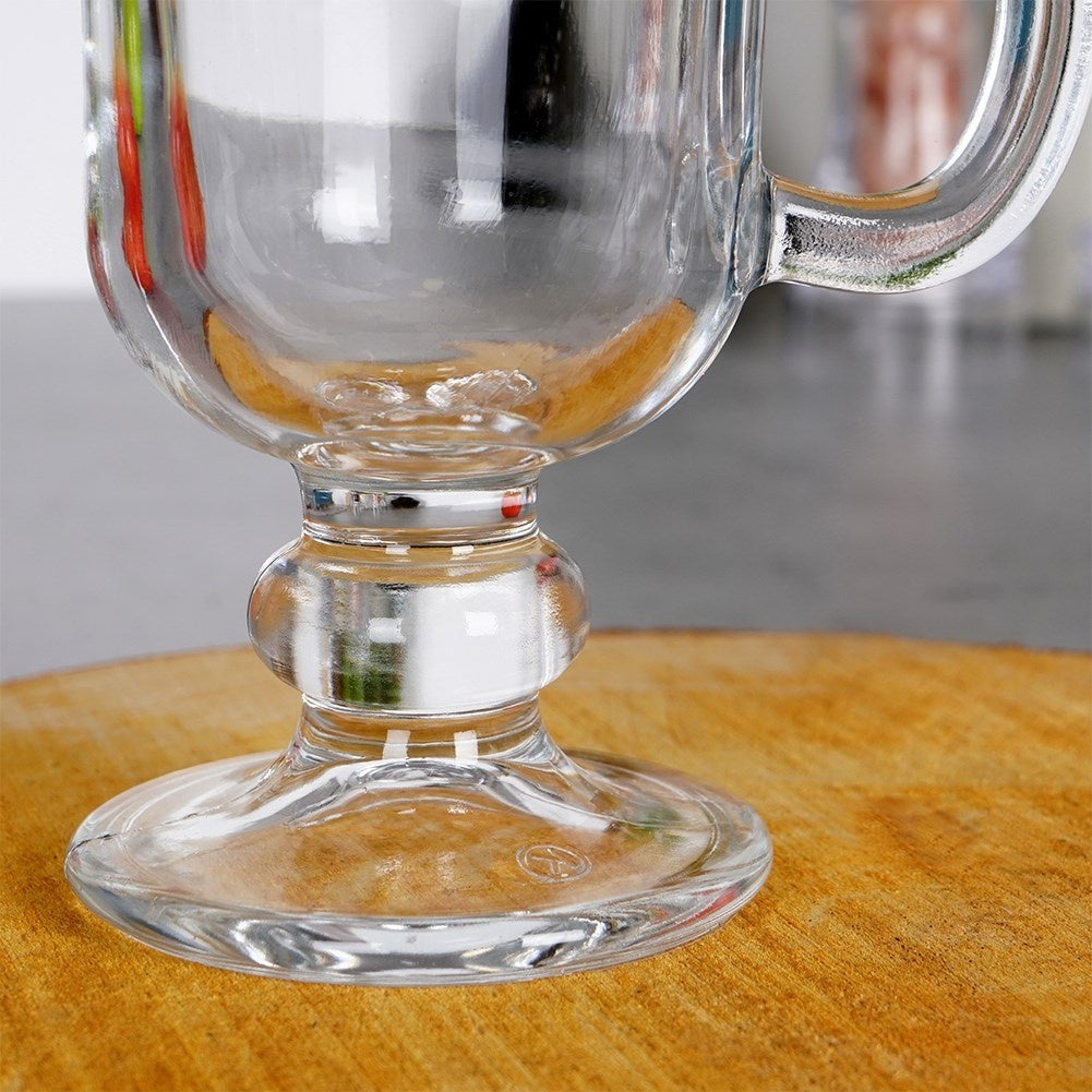 Elegant glass with handle on foot for hot drinks
