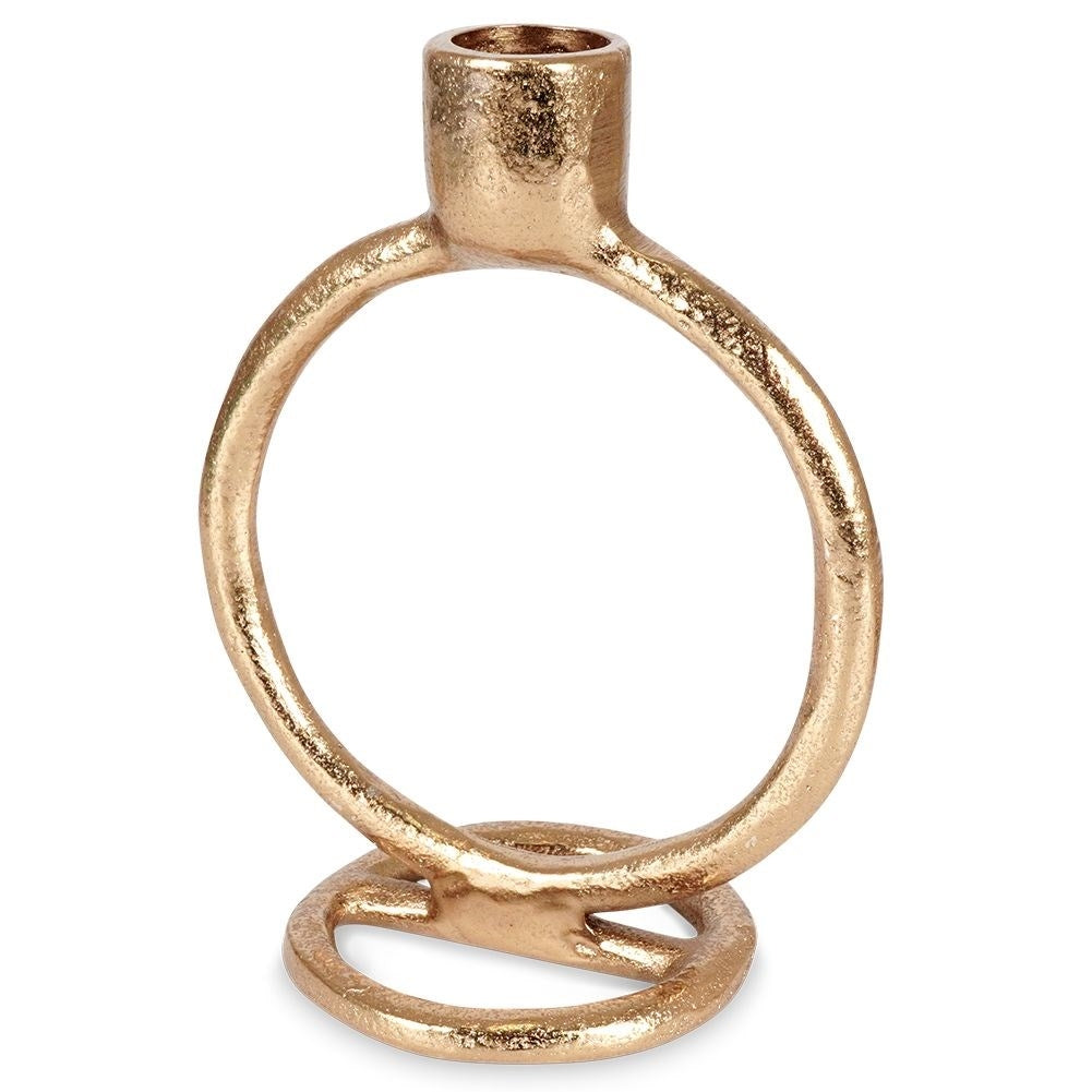 Elegant golden candlestick in classic style for long candles