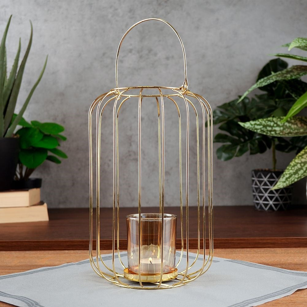 Elegant gold lantern for candle or tealight, metal and glass