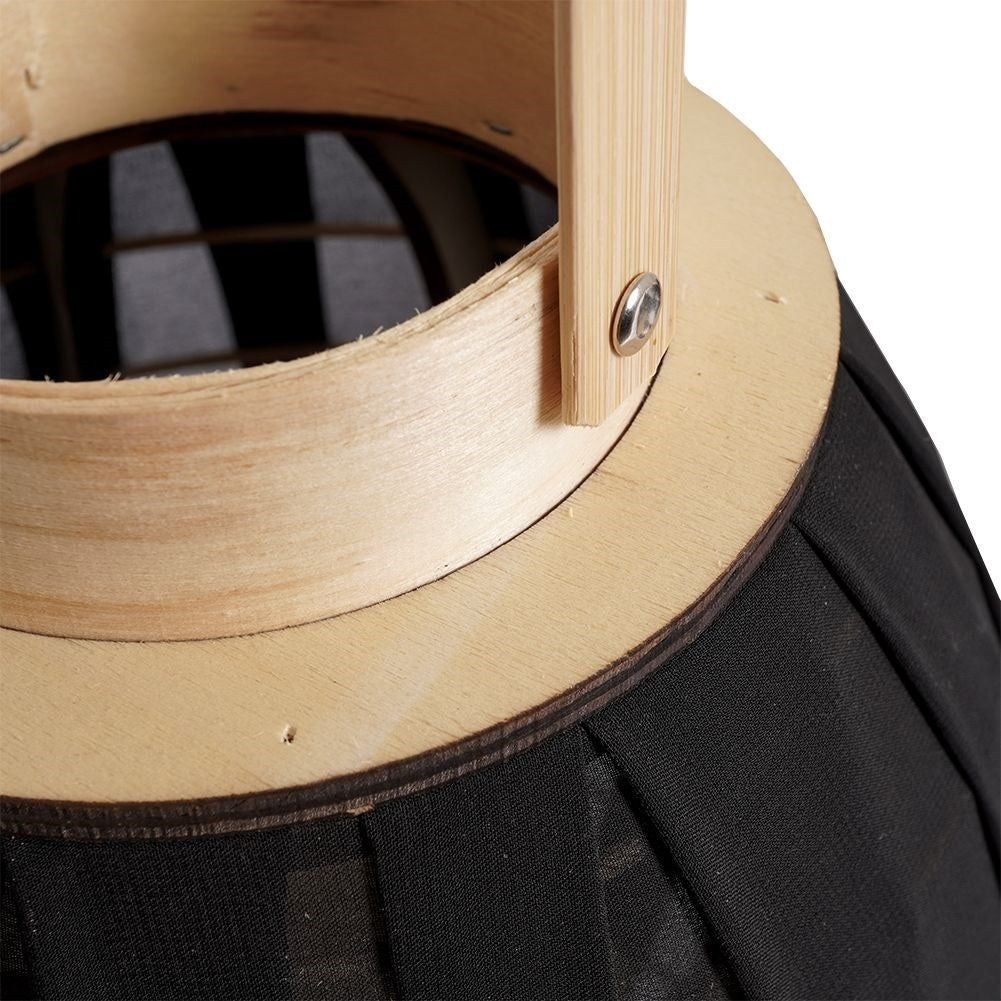 Elegant lantern on wooden stand with glass insert and handle