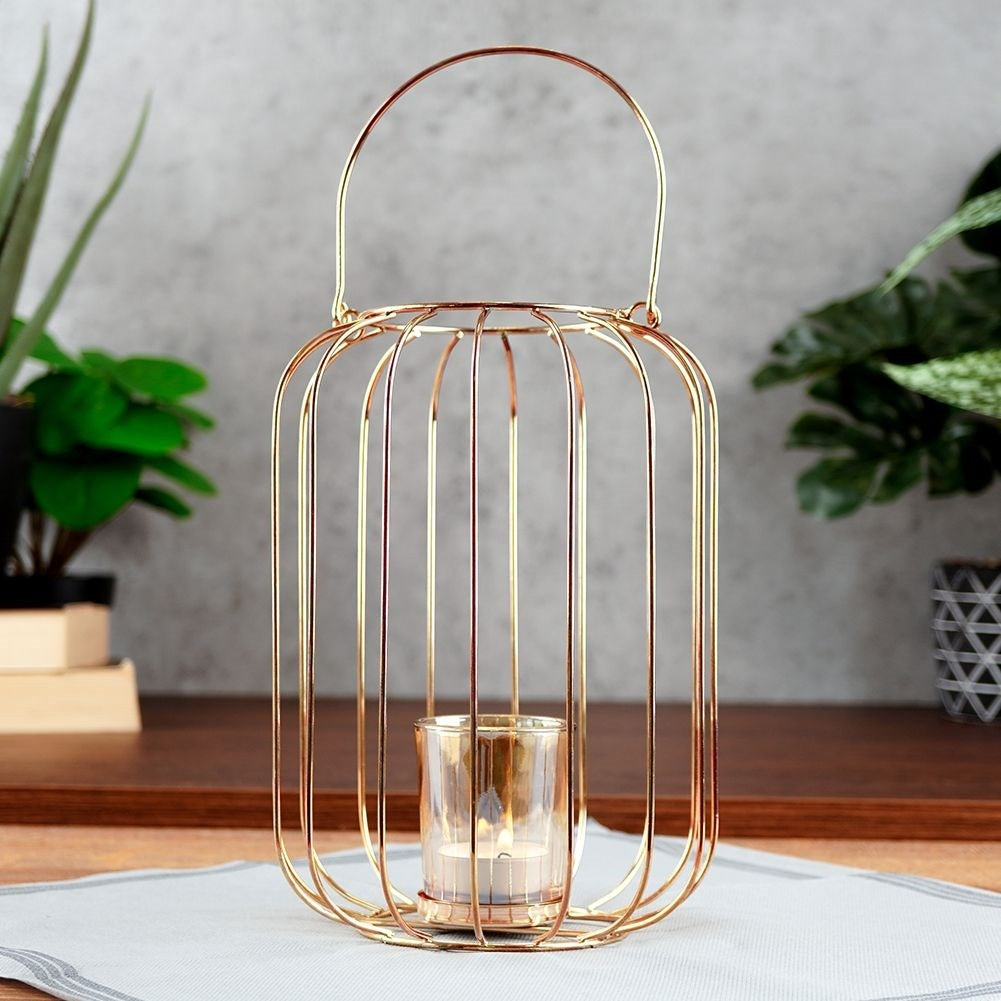 Elegant metal and glass candle lantern for candles or tealights