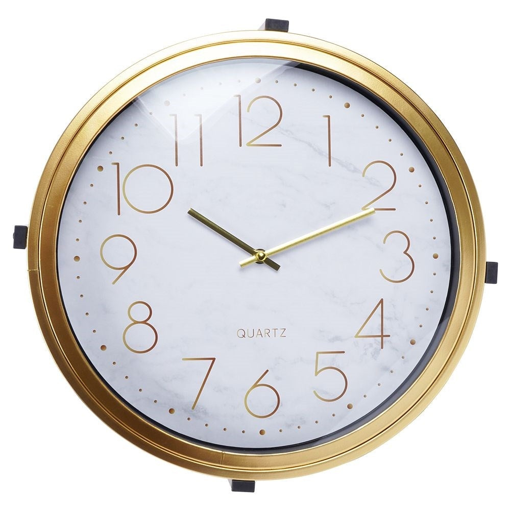Elegant metal coffee table with built-in clock and golden finish