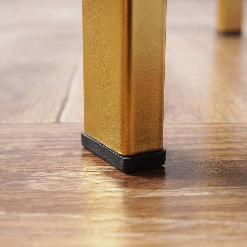 Elegant metal coffee table with built-in clock and golden finish