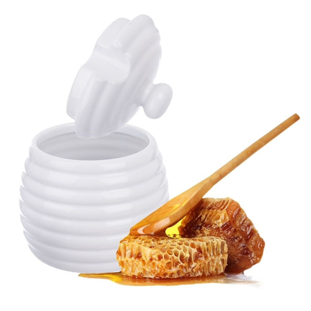 Elegant porcelain container for honey with lid and spoon