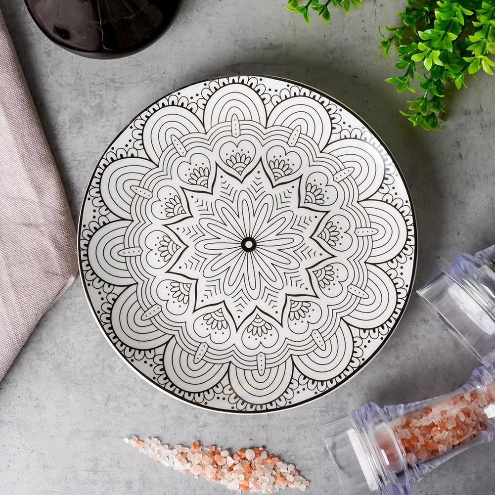 Elegant porcelain dessert plate with black mandala pattern