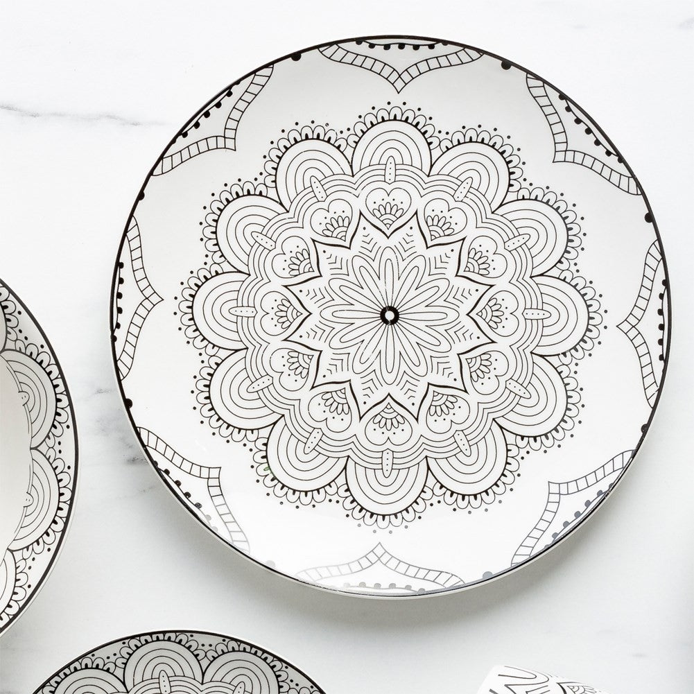Elegant porcelain dinner plate with black mandala pattern