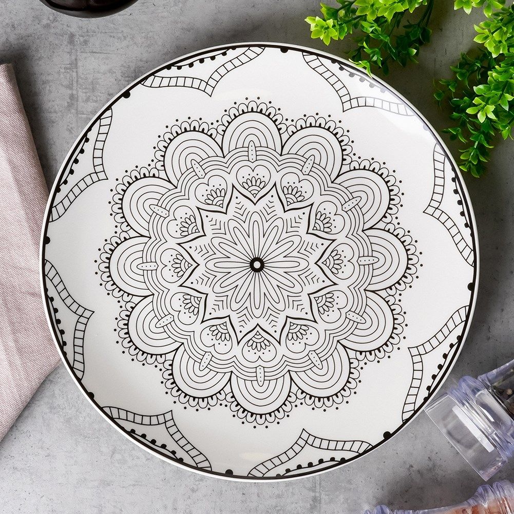 Elegant porcelain dinner plate with black mandala pattern