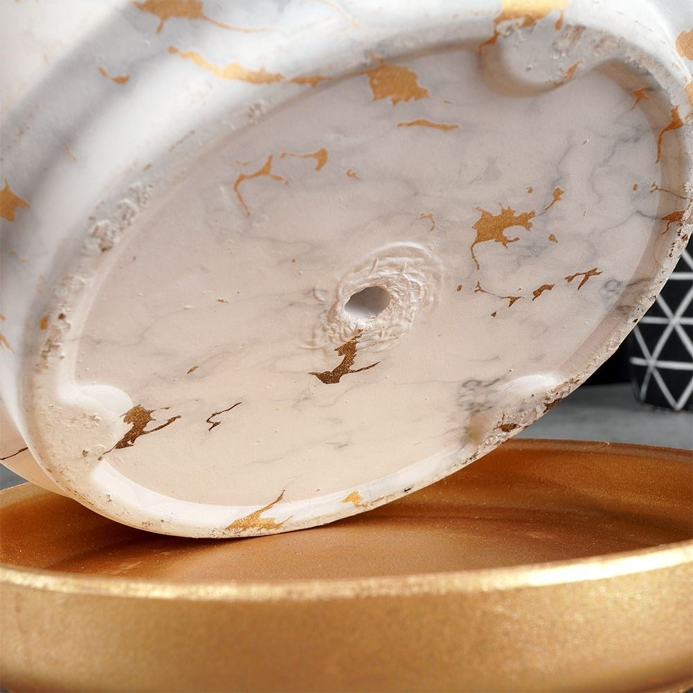 Elegant pot with saucer in marble style, white ceramic, gilded details
