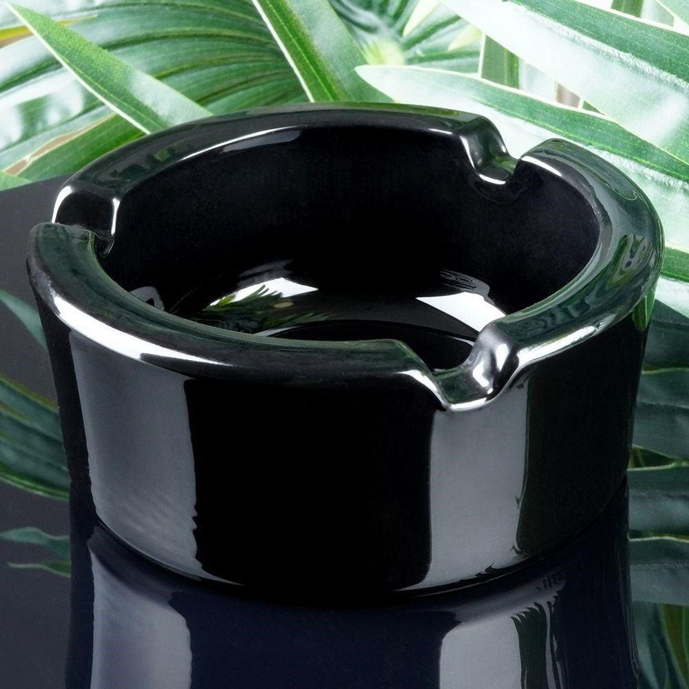 Elegant round ashtray in black glass for home & garden