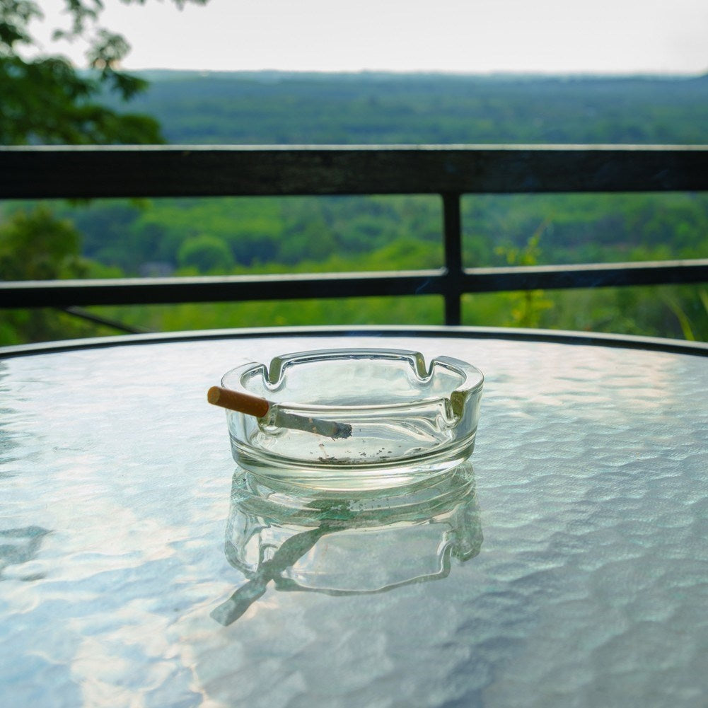 Elegant round glass ashtray for home, garden and bar