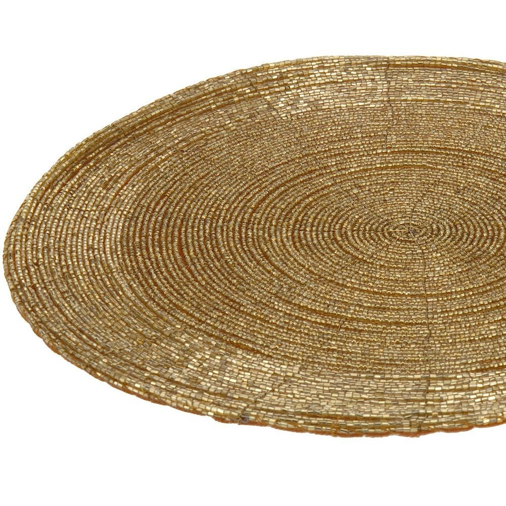 Elegant round placemat in trendy golden colour