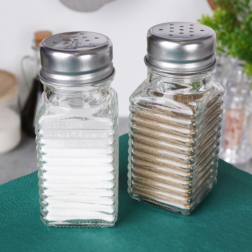 Elegant serving set for salt & pepper in glass & metal