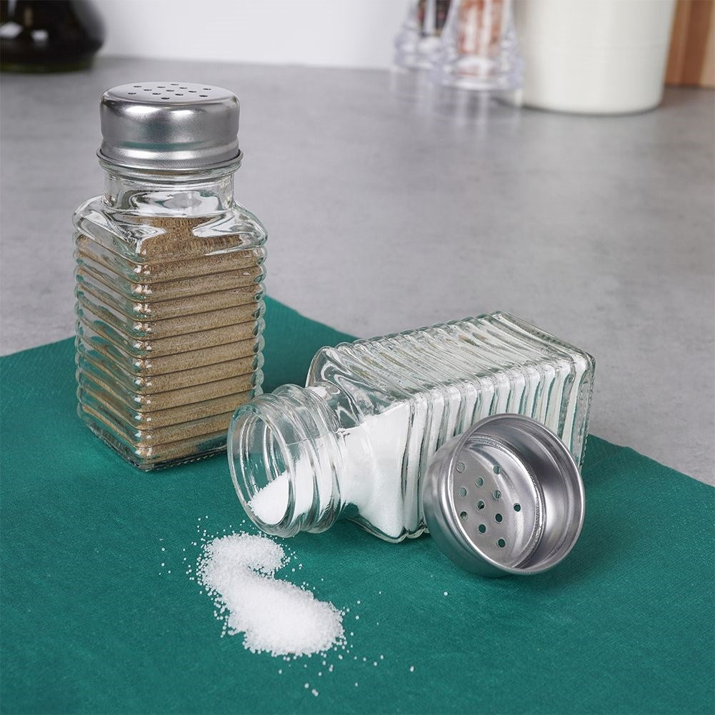 Elegant serving set for salt & pepper in glass & metal