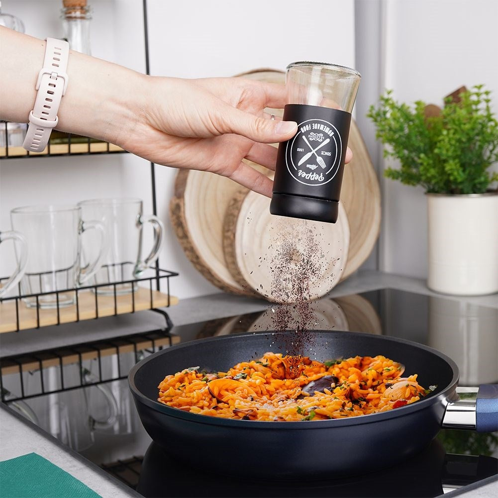 Elegant serving set in glass and black metal for salt & pepper