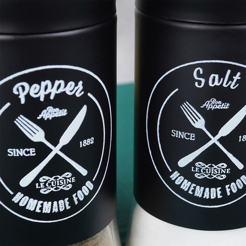 Elegant serving set in glass and black metal for salt & pepper
