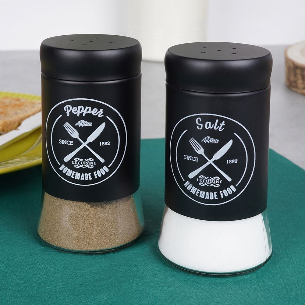 Elegant serving set in glass and black metal for salt & pepper