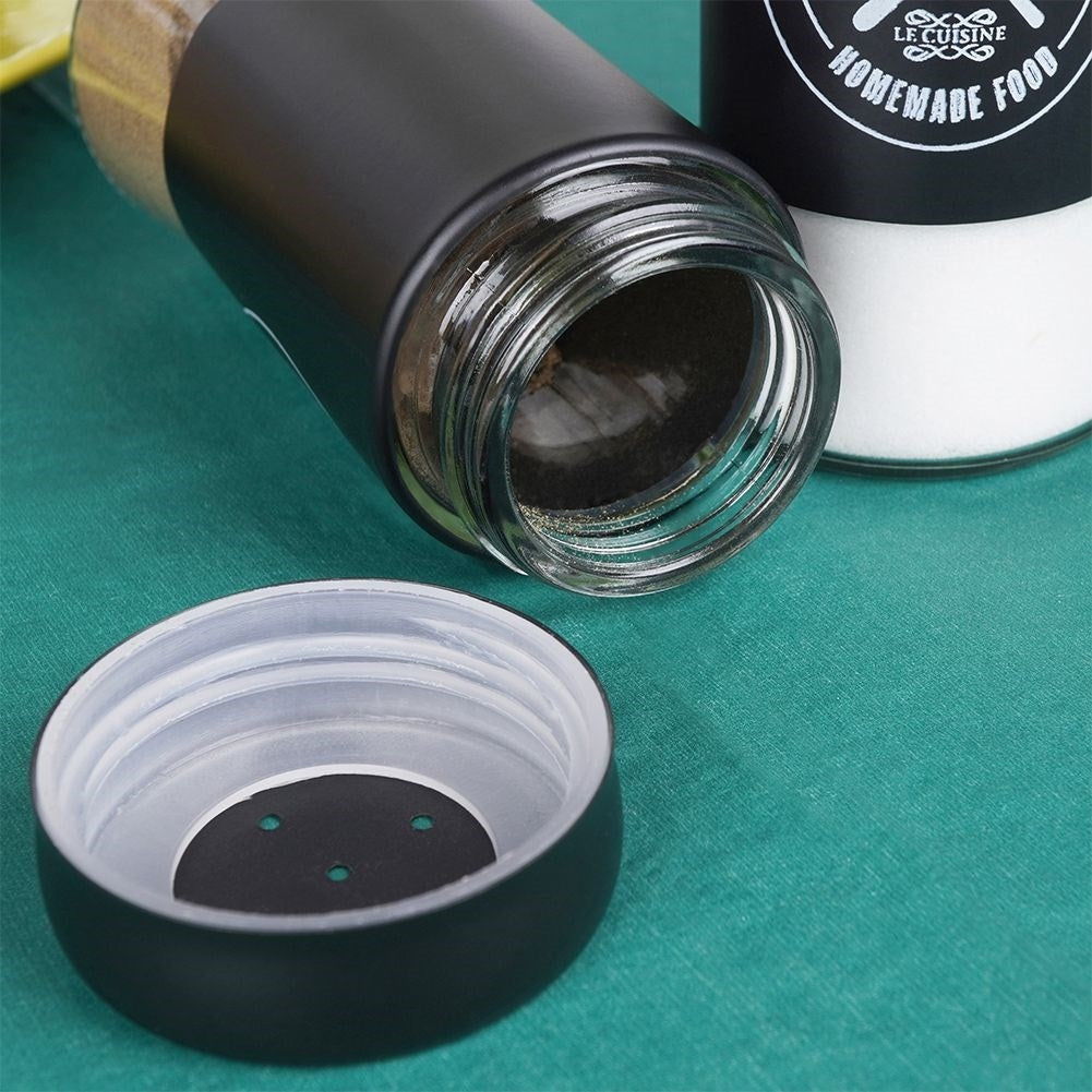 Elegant serving set in glass and black metal for salt & pepper