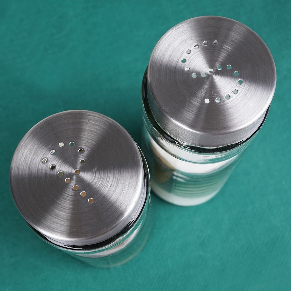 Elegant set for salt & pepper in glass and stainless steel